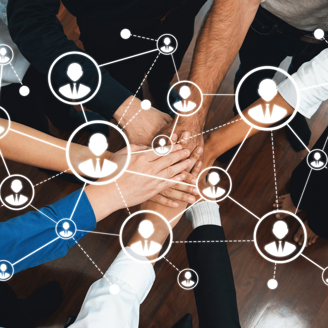 Group of diverse hands stacked together overlaid with network icons, symbolizing a global community of travel agents